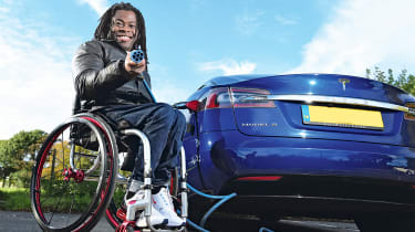 Ade Adepitan and his Tesla Model S