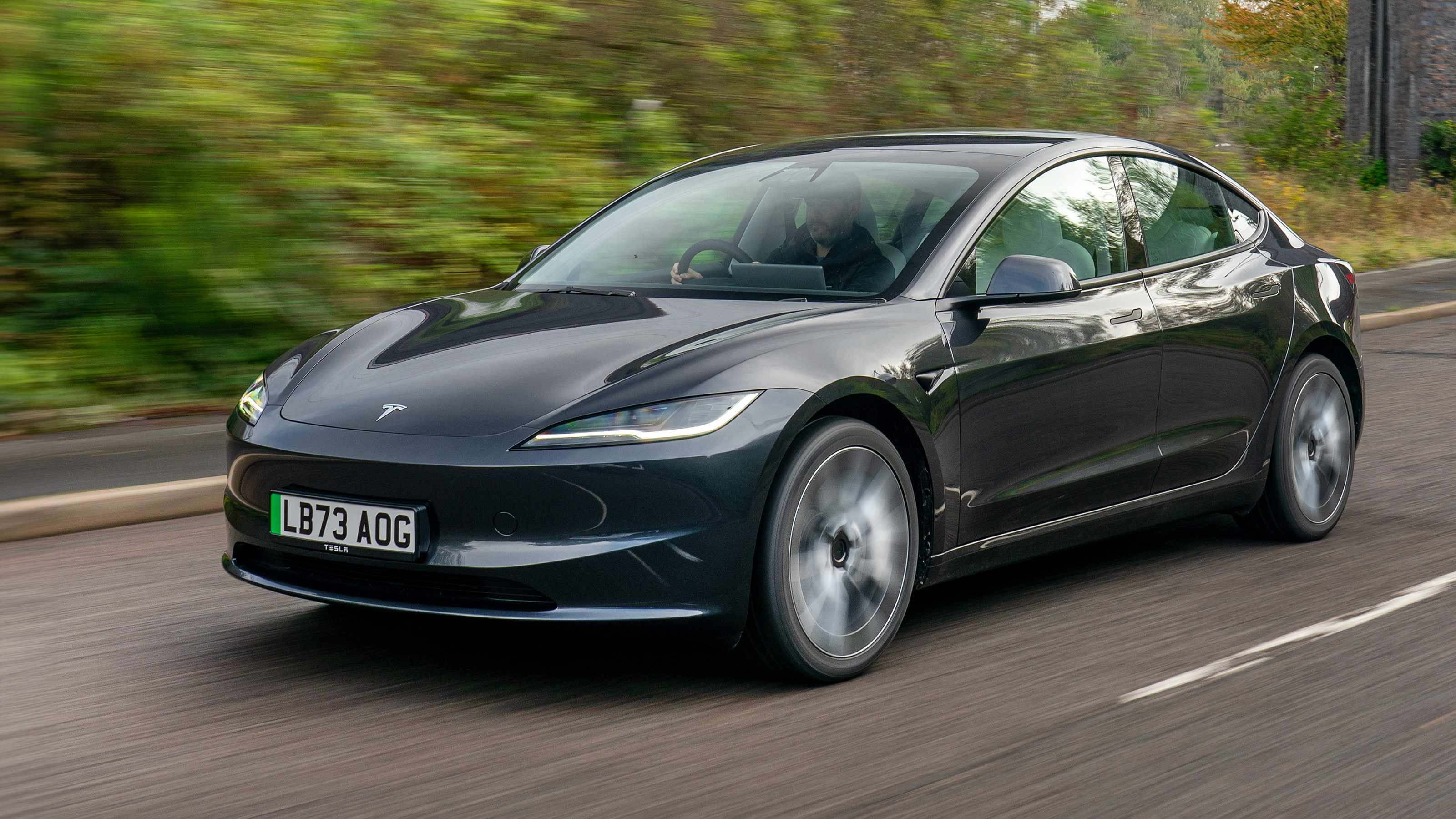 New Tesla Model 3 goes further on a charge, gets higher-quality