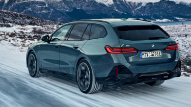 BMW i5 Touring - rear dynamic