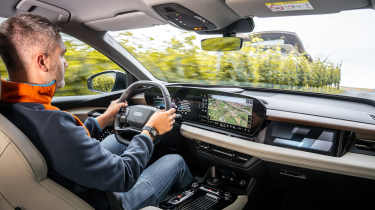 Richard Ingram driving the Audi Q6 e-tron