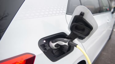 Electric VW ID3 car charging outside of Tesco, Potters bar, 24th November 2019