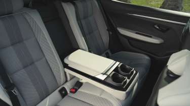 Renault Scenic E-Tech 2024 - rear storage and cup holders 