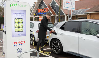 Electric VW ID3 car charging outside of Tesco, Potters bar, 24th November 2019