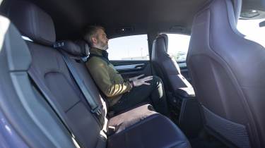 Richard Ingram sitting in the Porsche Macan&#039;s back seat